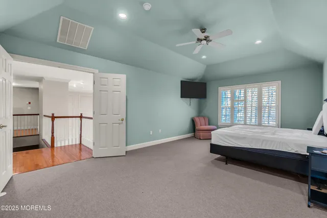 a view of a chairs and table on the wooden deck