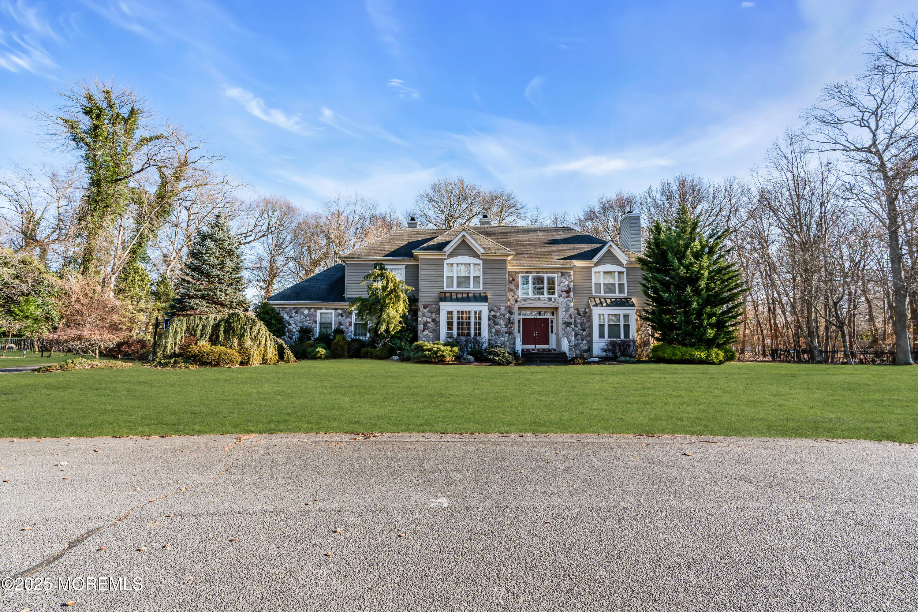 26 Bruns Road Allenhurst, NJ 07711 - Photo 6 of 82 a view of a big house with a big yard and large trees