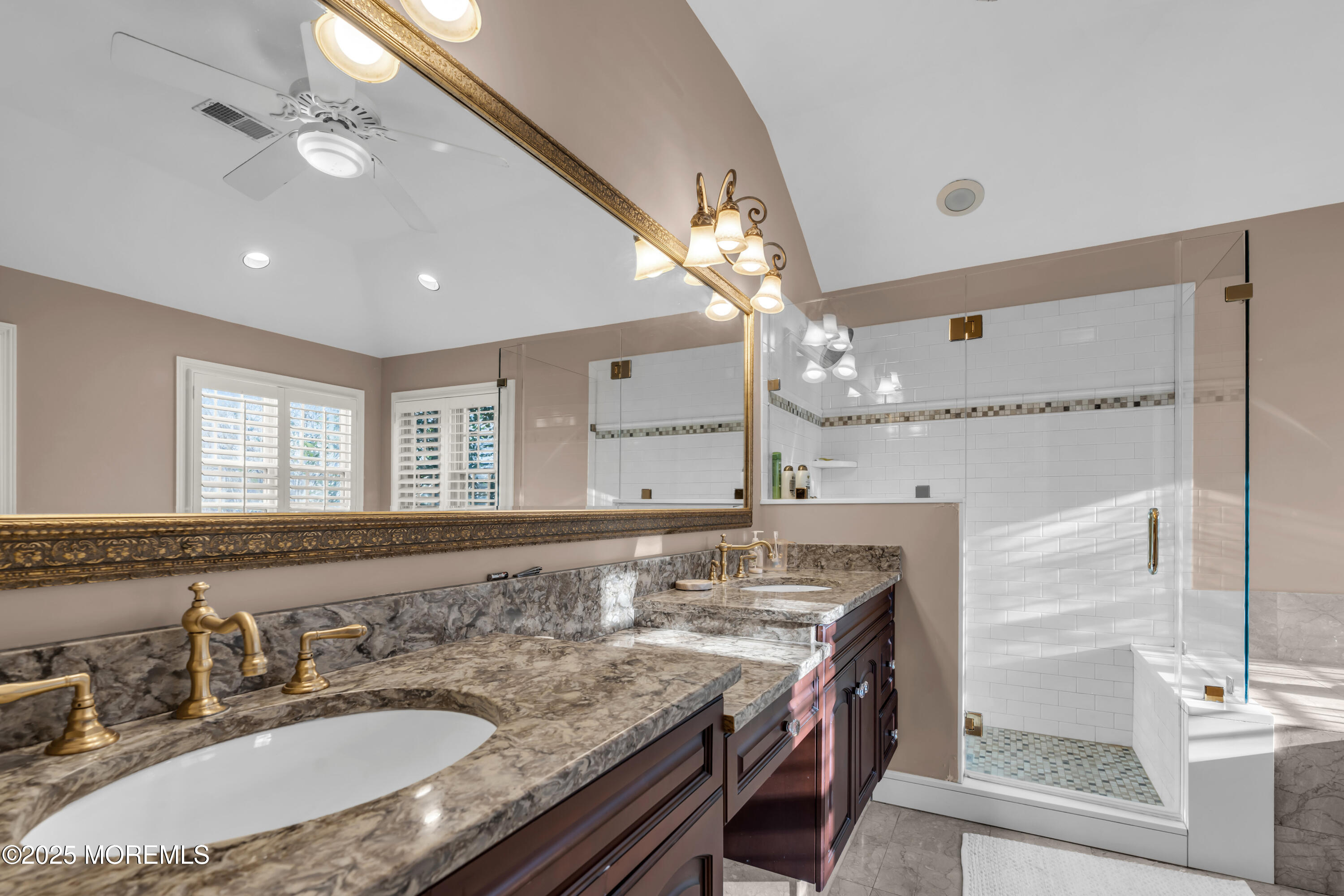 26 Bruns Road Allenhurst, NJ 07711 - Photo 61 of 82 a bathroom with a granite countertop sink a large mirror and a shower