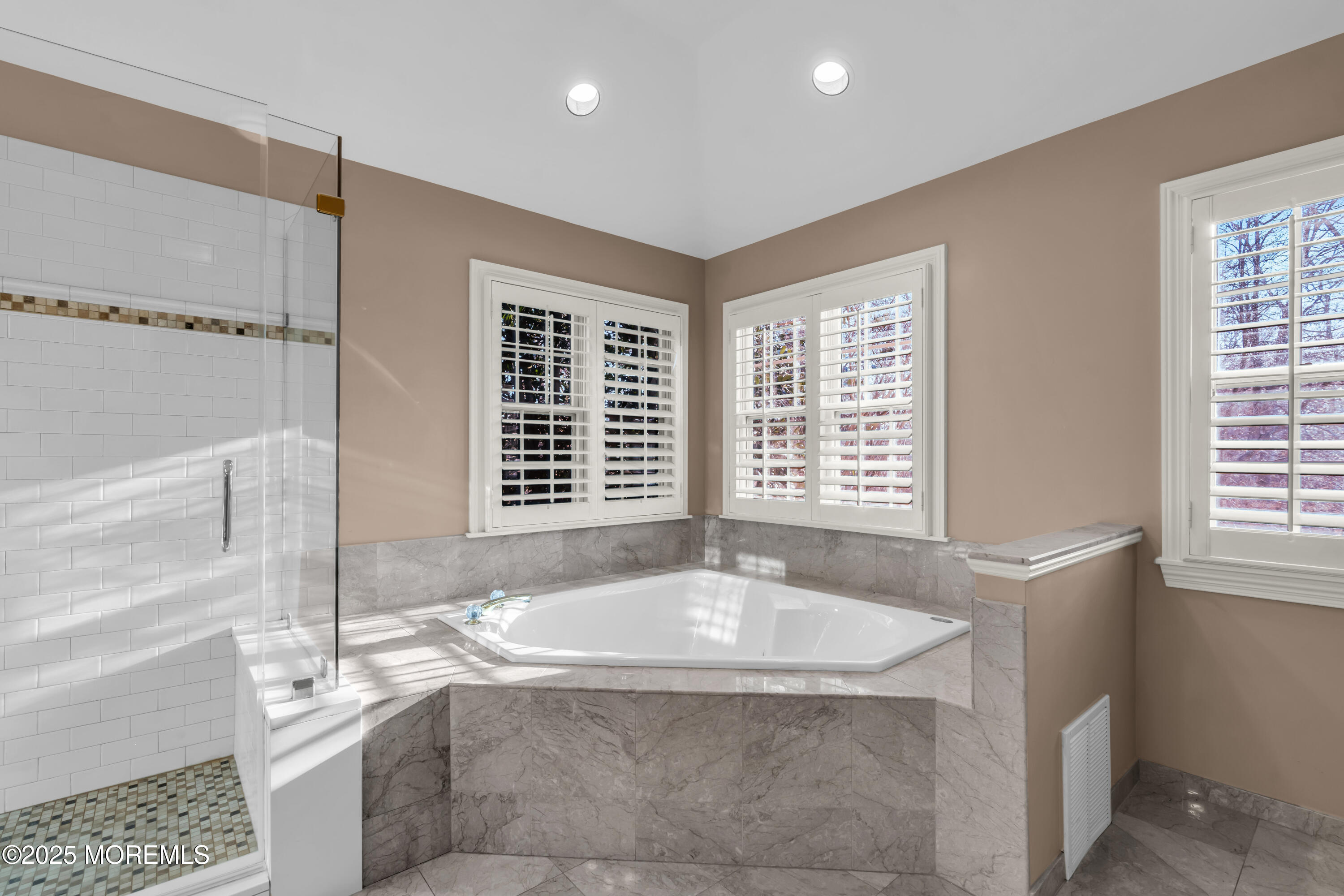 26 Bruns Road Allenhurst, NJ 07711 - Photo 62 of 82 a bathroom with a tub a sink and a window