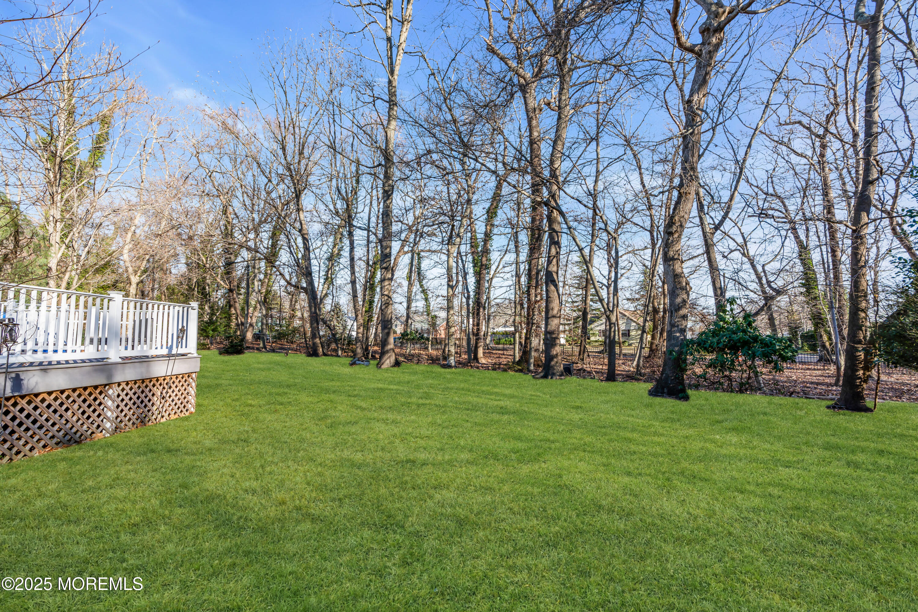 26 Bruns Road Allenhurst, NJ 07711 - Photo 76 of 82 a garden with trees in front of it