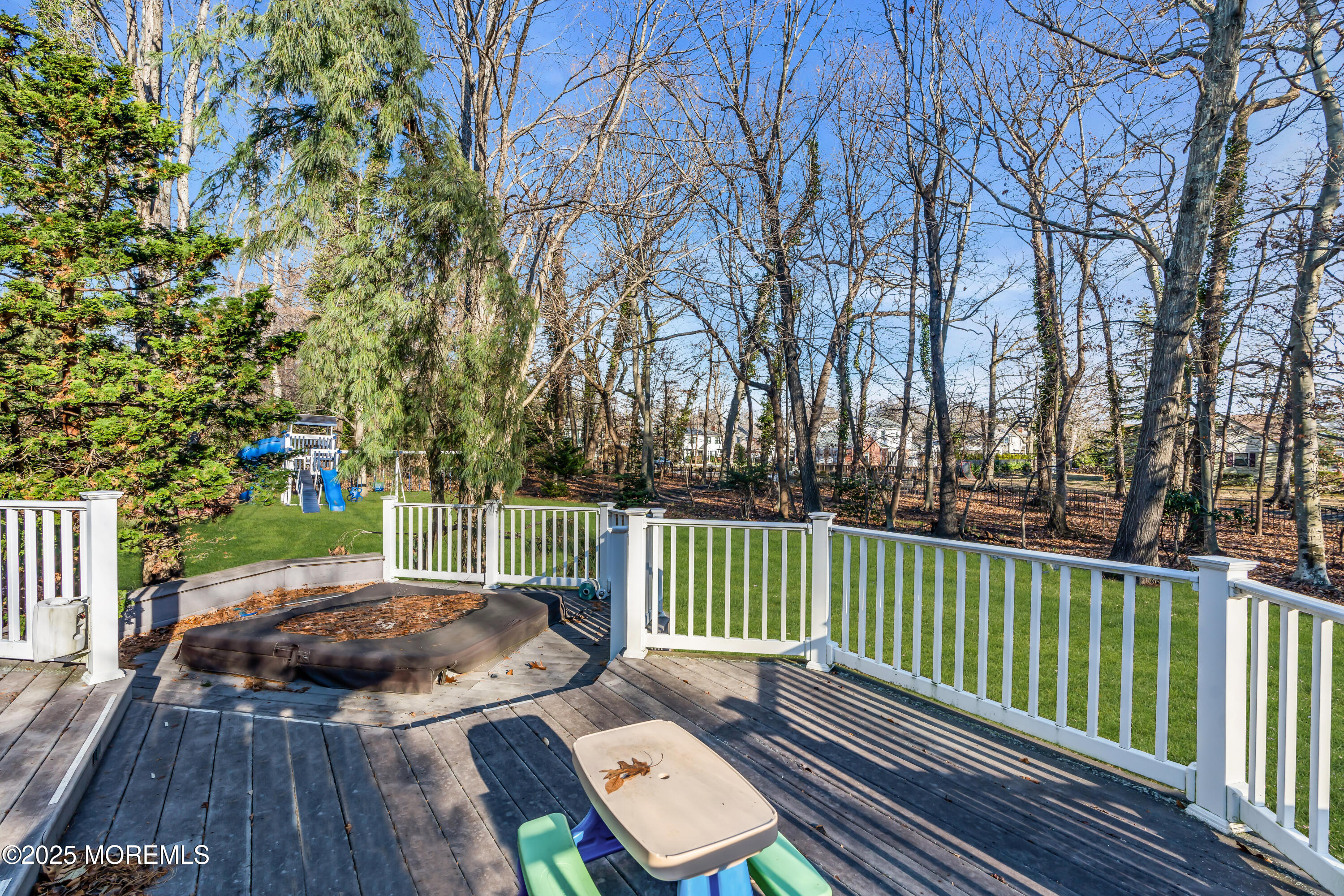26 Bruns Road Allenhurst, NJ 07711 - Photo 82 of 82 a view of backyard with a deck and furniture