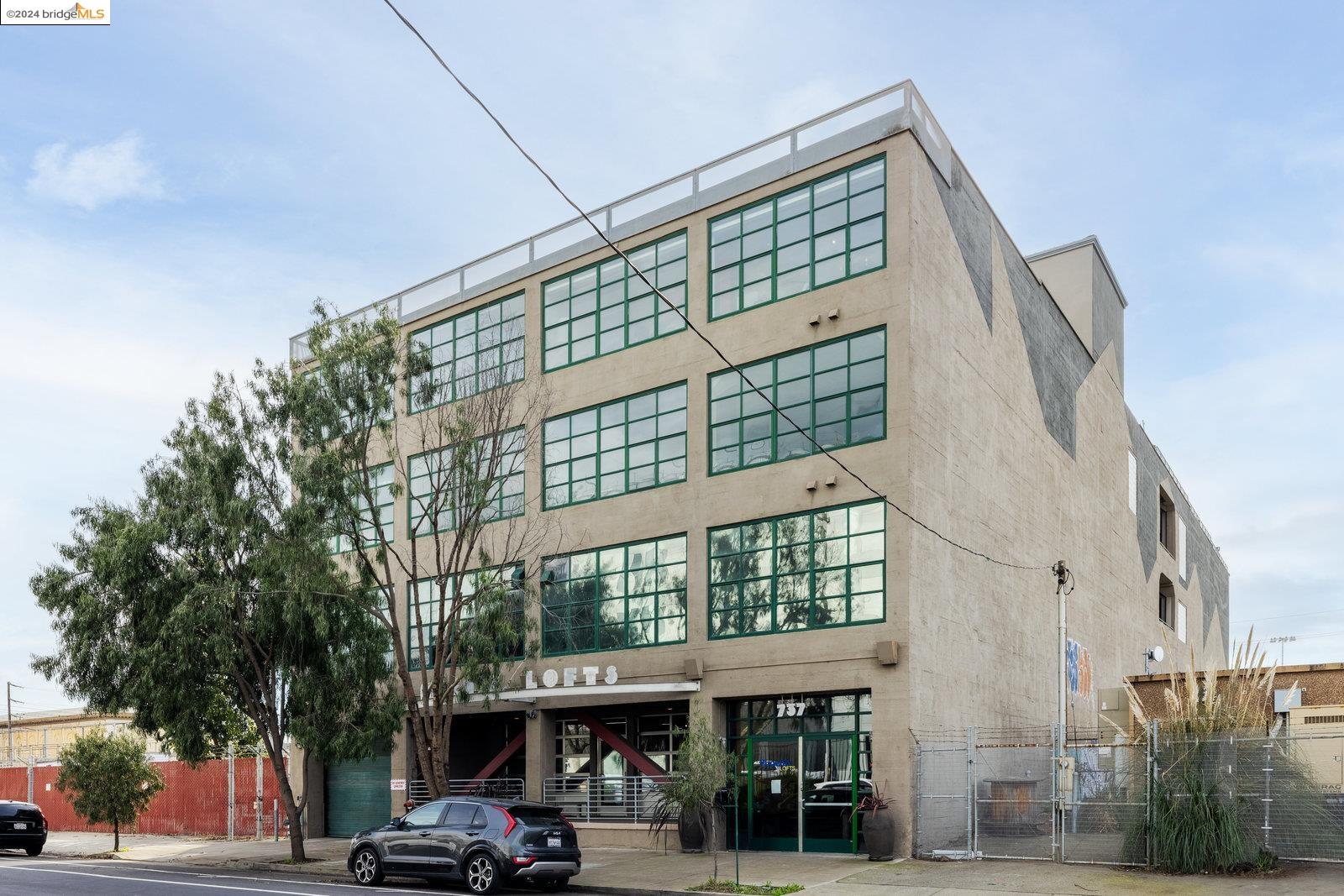 737 2nd Street, Unit 309 Oakland, CA 94607 - Photo 1 of 1 a front view of a building with street