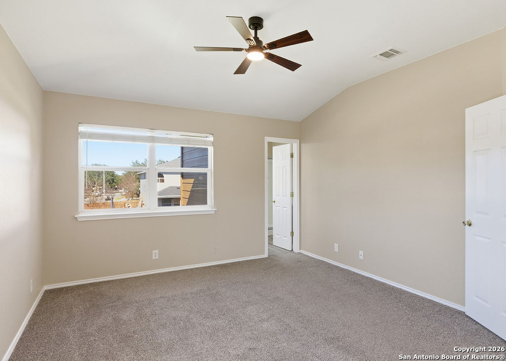 8905 Pinseeker Selma, TX 78154 - Photo 14 of 23 a view of an empty room with a window
