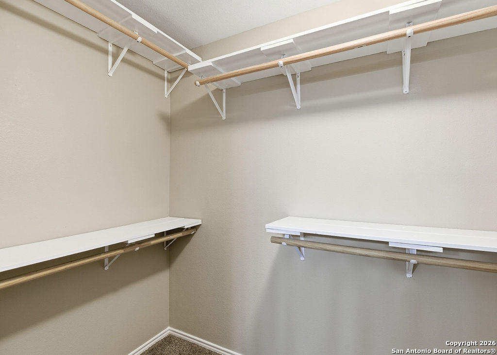 8905 Pinseeker Selma, TX 78154 - Photo 20 of 23 a close up view of racks on the wall