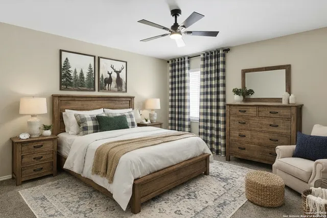 a bedroom with a bed and dresser