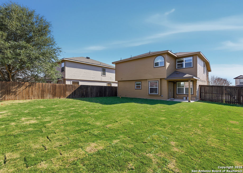 8905 Pinseeker Selma, TX 78154 - Photo 22 of 23 a view of a house with a back yard