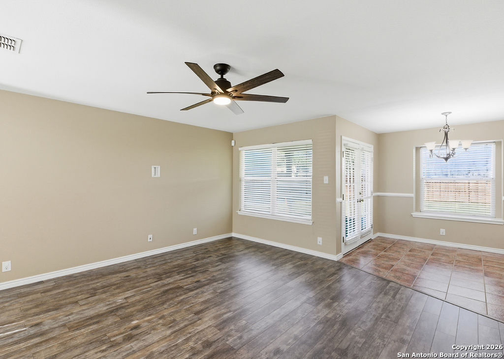 8905 Pinseeker Selma, TX 78154 - Photo 6 of 23 a view of an empty room with a window