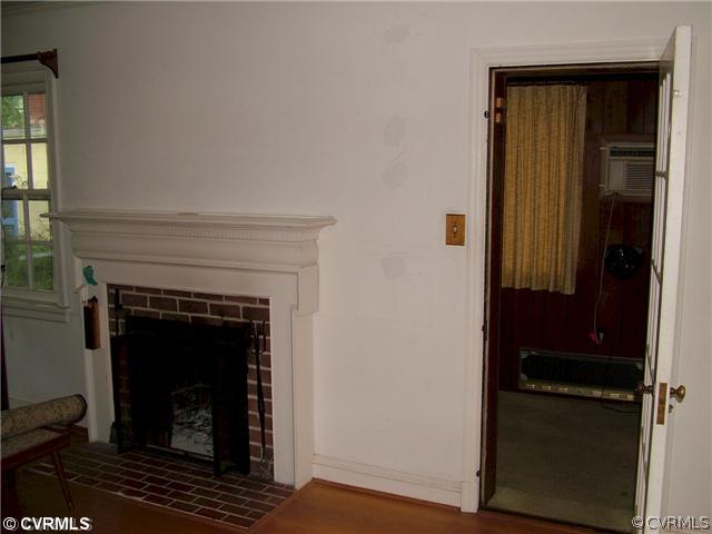 3309 Gloucester Road Richmond, VA 23227 - Photo 3 of 9 Living Room - boxes, furniture stacked for Goodwil