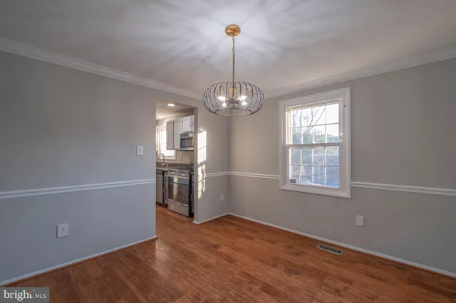 a living room with furniture fireplace and flat screen tv
