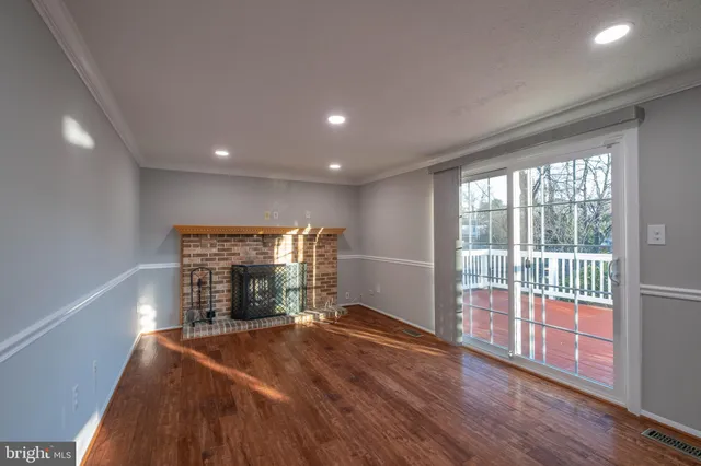 a view of an chairs and table in the patio