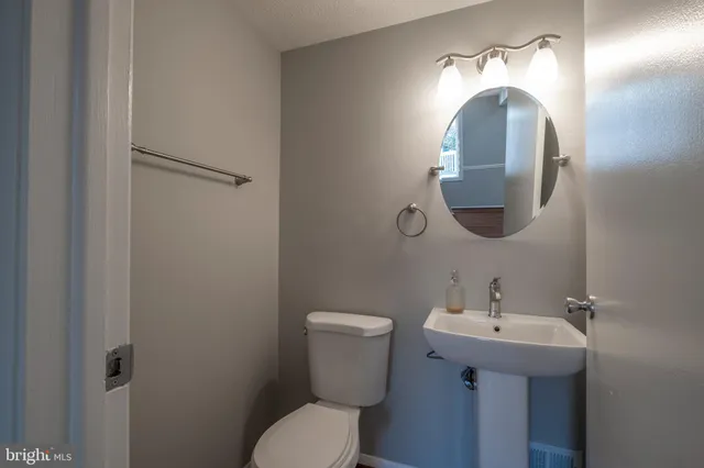 a front view of a building with small garden