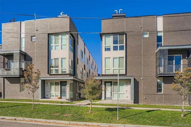 a view of a building with a yard