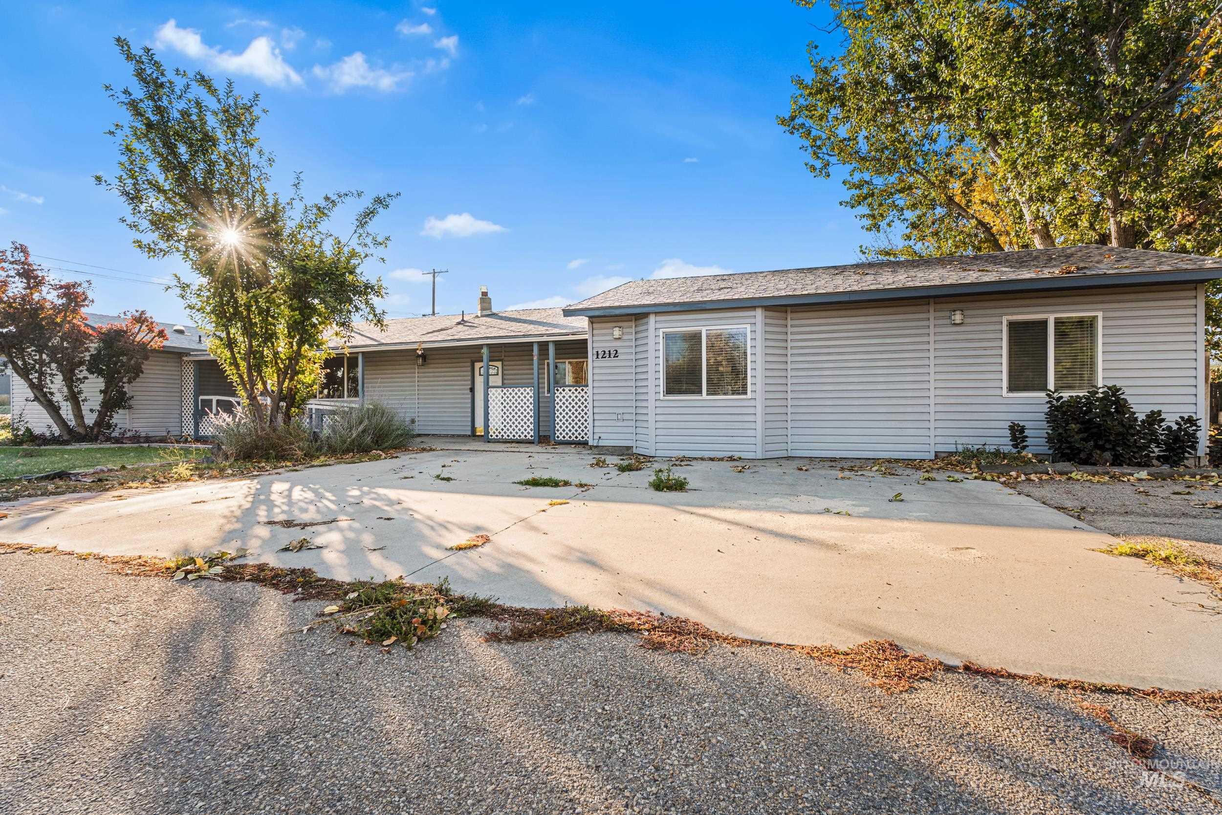1212 East Ustick Road Caldwell, ID 83607 - Photo 2 of 50 Ranch-style house with concrete driveway