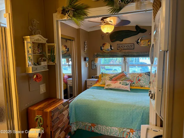 a swimming pool with outdoor seating and a garden