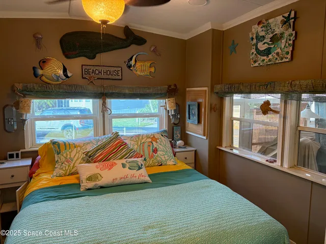 a view of a backyard with table and chairs