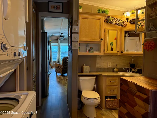 a view of a house with backyard and a garden