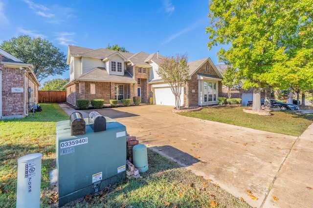 a view of a building with a garden
