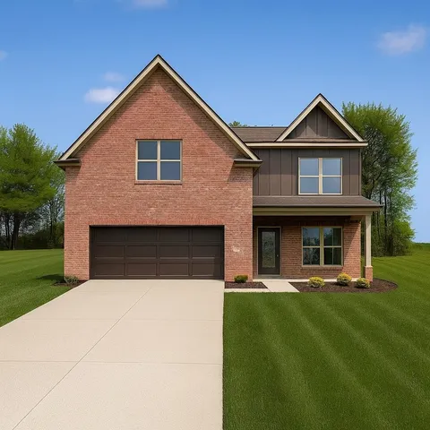 a front view of house with yard and green space