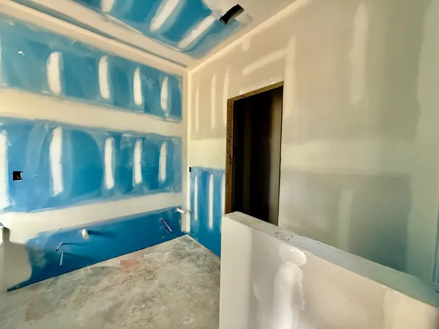 an empty room with windows