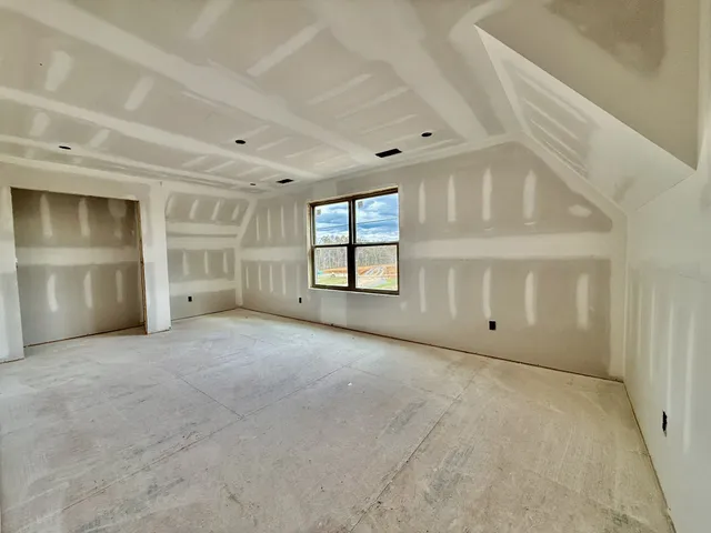 a house with yard in front of it