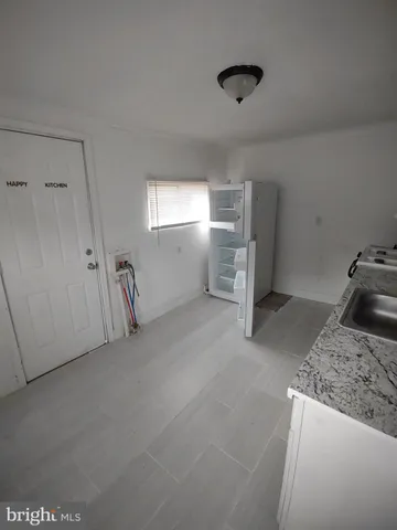 a view of a livingroom with furniture