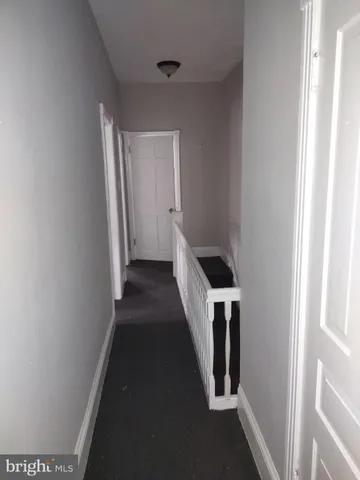 a view of a hallway with entryway