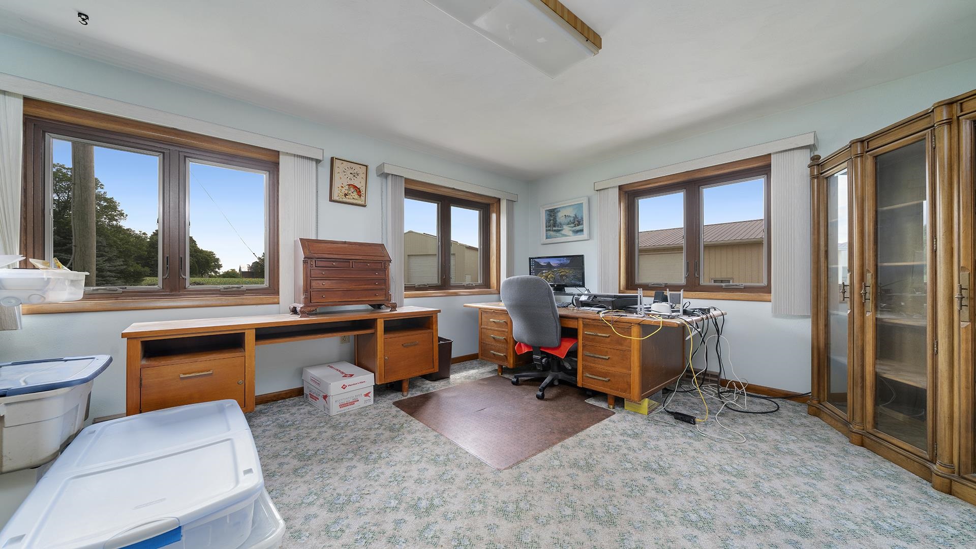 10245 West Penn Corner Road Polo, IL 61064 - Photo 18 of 48 a living room with furniture a window and a flat screen tv