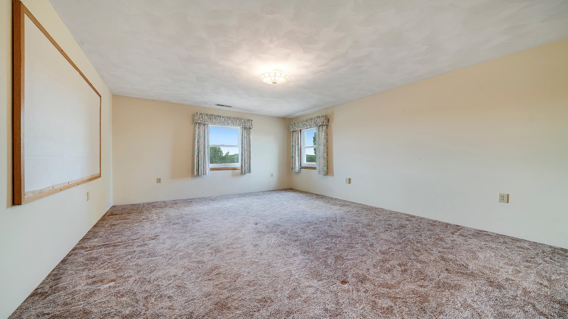 10245 West Penn Corner Road Polo, IL 61064 - Photo 26 of 48 a view of an empty room with windows