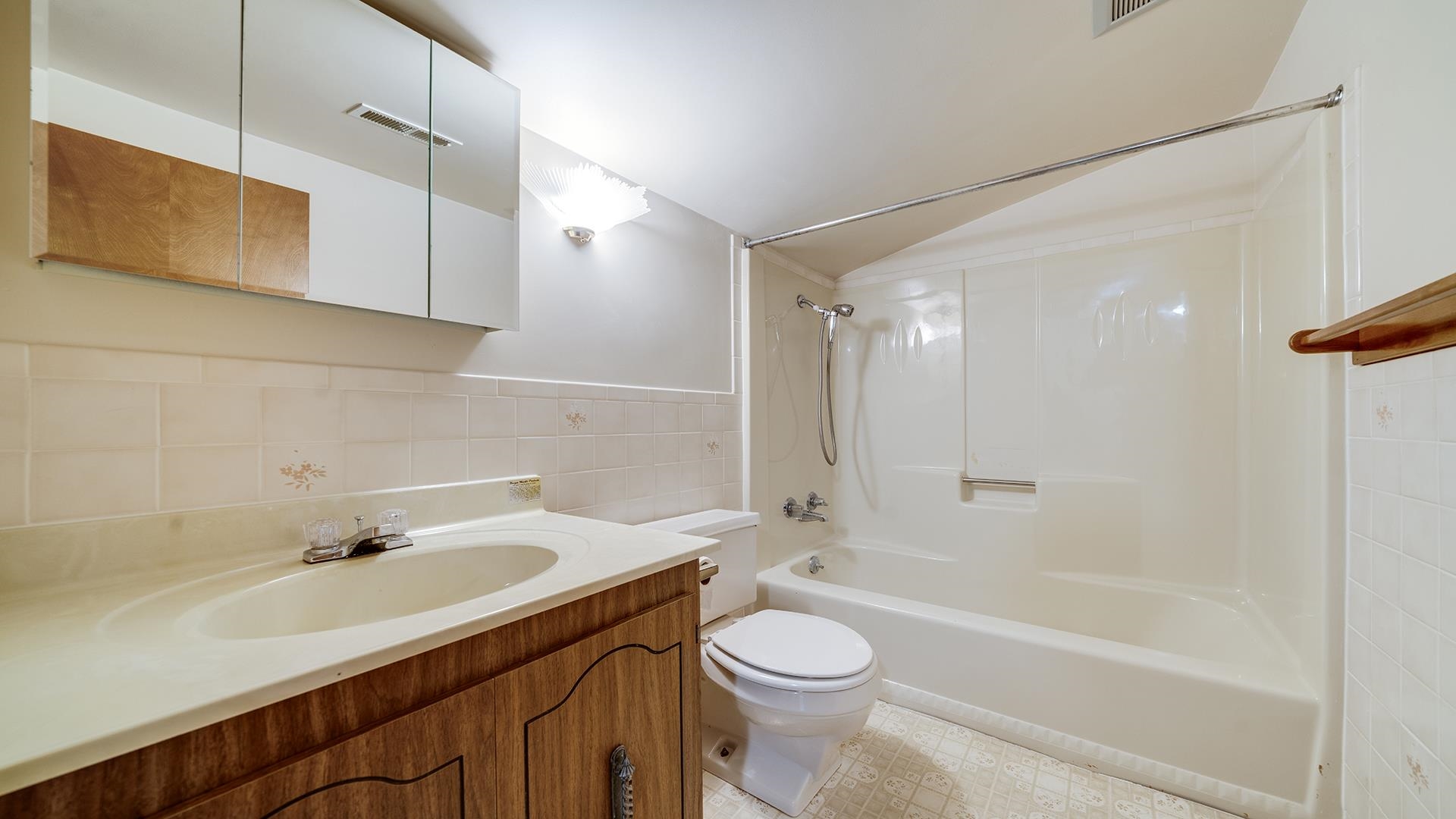 10245 West Penn Corner Road Polo, IL 61064 - Photo 27 of 48 a bathroom with a sink a toilet and shower