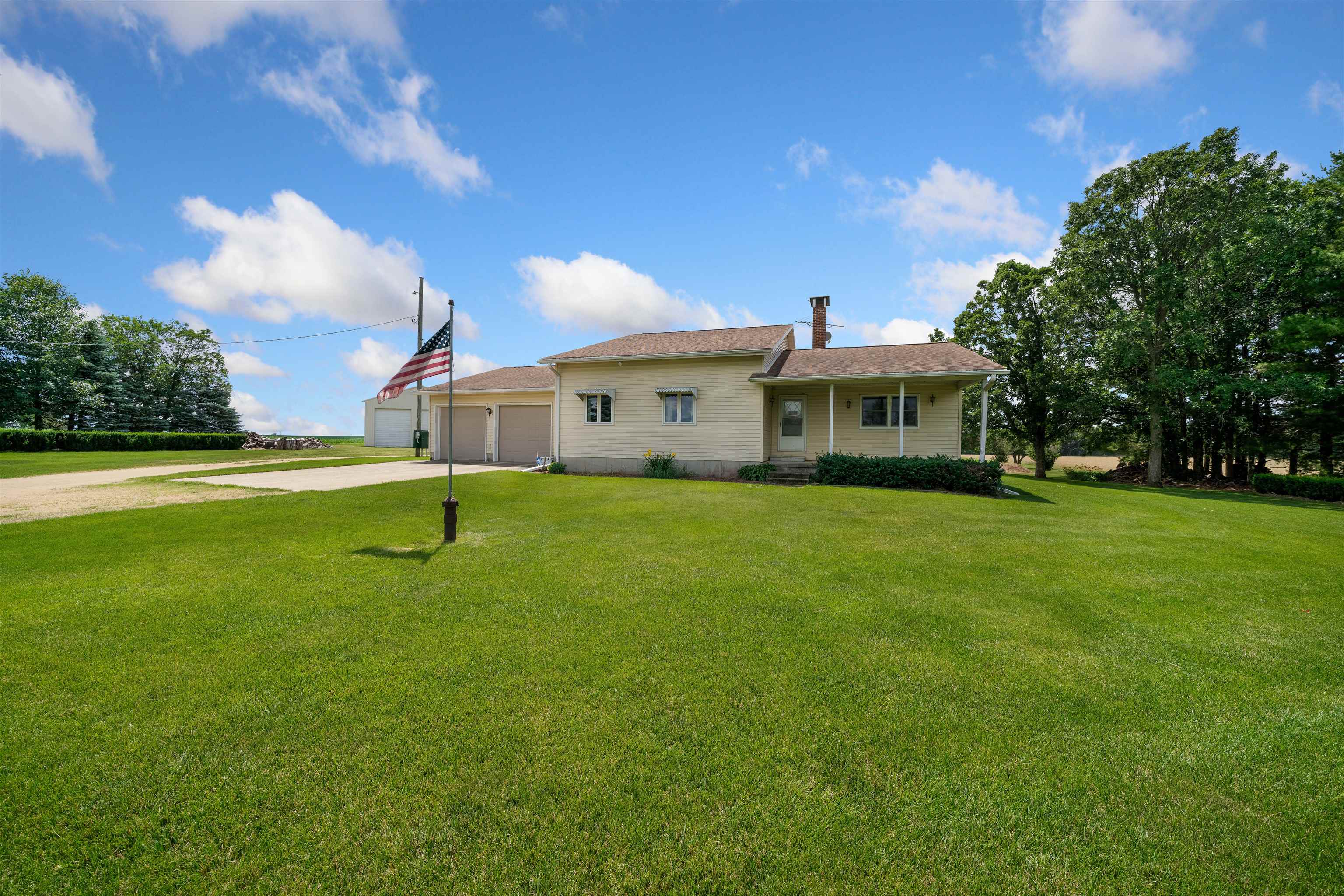 10245 West Penn Corner Road Polo, IL 61064 - Photo 3 of 48 a view of a house with a backyard