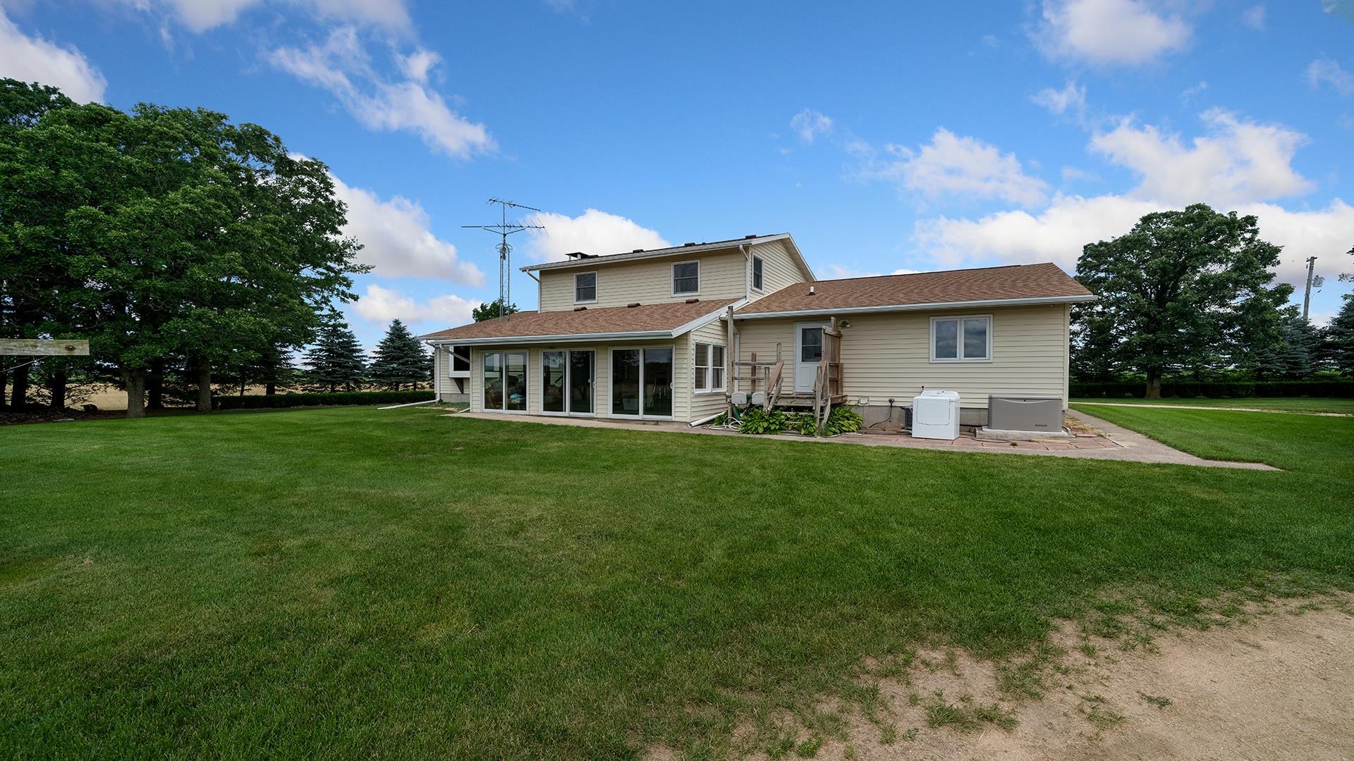 10245 West Penn Corner Road Polo, IL 61064 - Photo 38 of 48 a front view of house with yard and green space