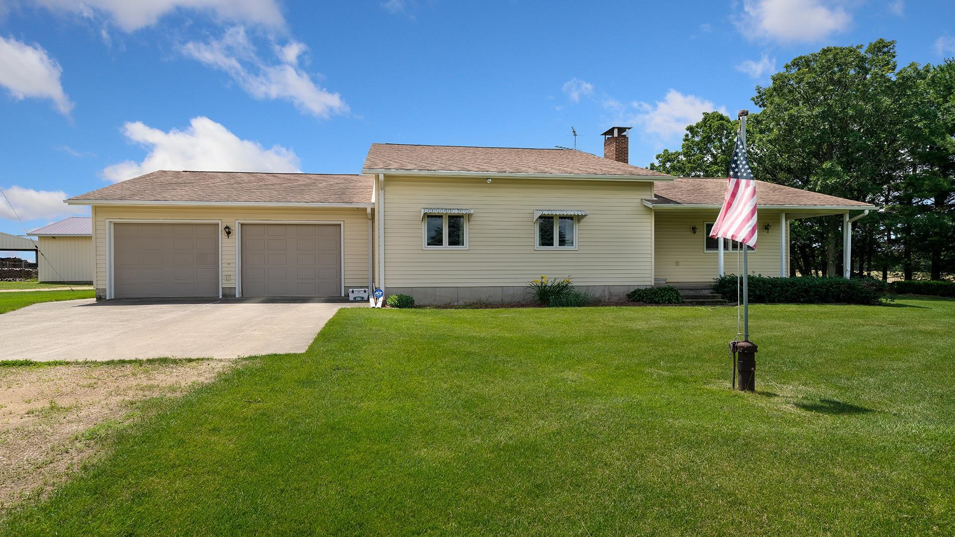 10245 West Penn Corner Road Polo, IL 61064 - Photo 4 of 48 a view of a house with a yard