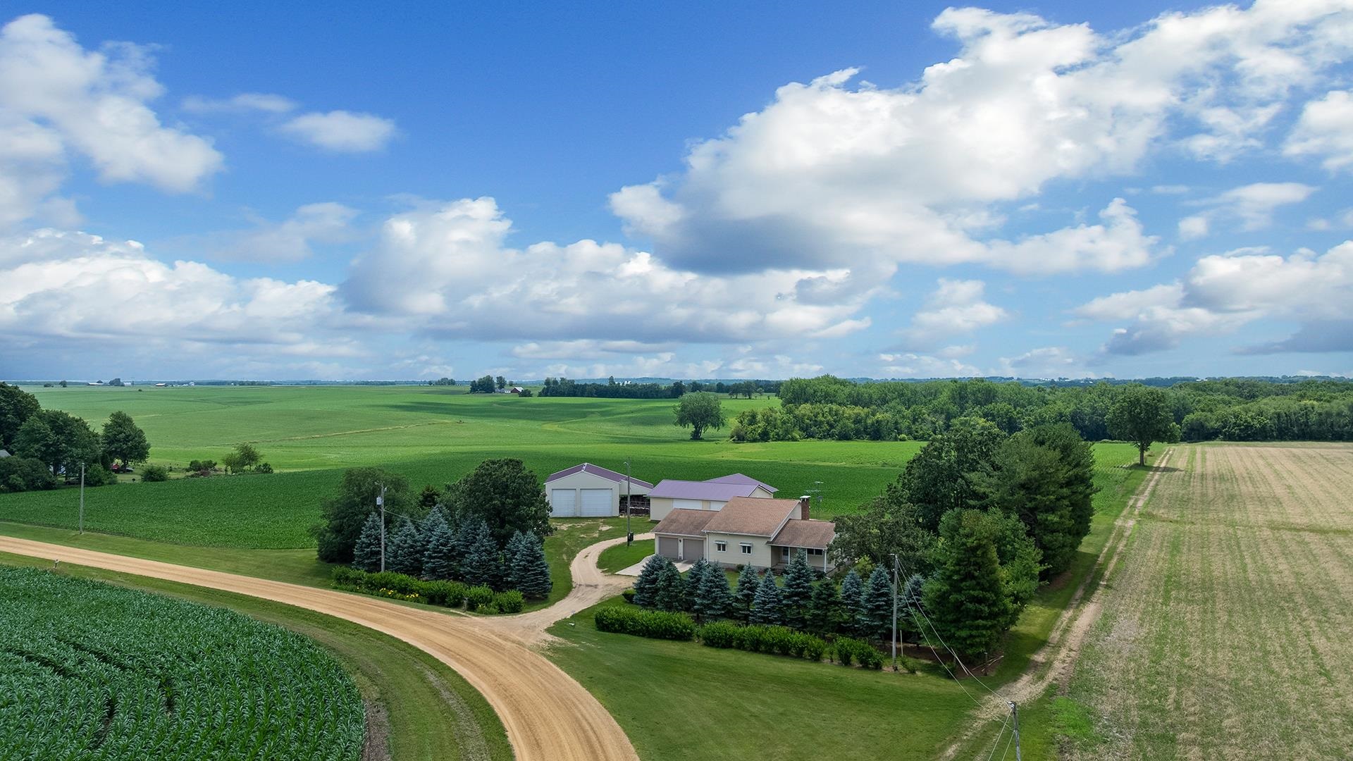 10245 West Penn Corner Road Polo, IL 61064 - Photo 46 of 48 a view of a lake with a garden