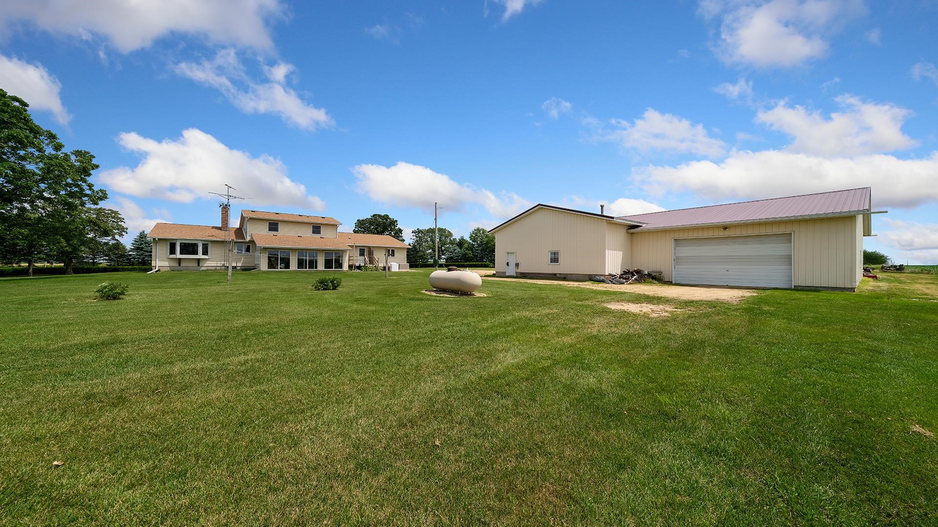 10245 West Penn Corner Road Polo, IL 61064 - Photo 5 of 48 a view of a house with a yard