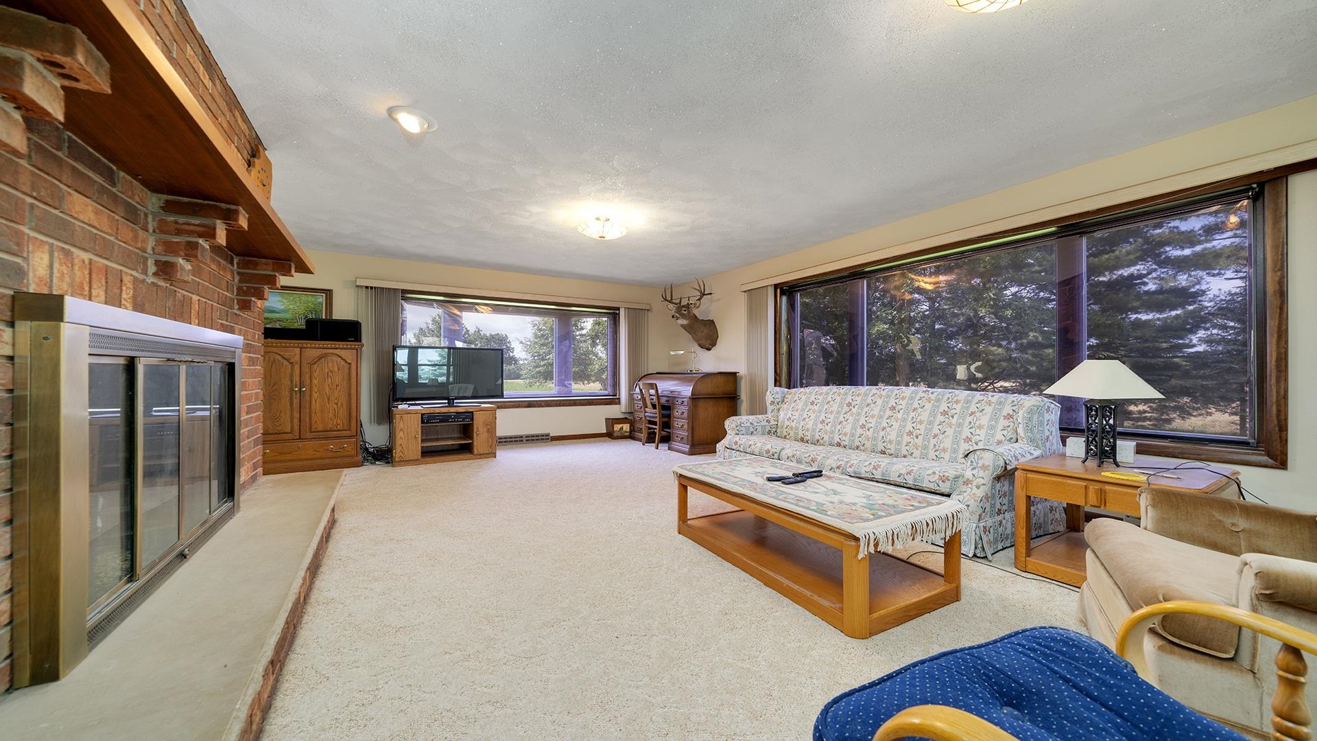 10245 West Penn Corner Road Polo, IL 61064 - Photo 6 of 48 a living room with furniture and a large window