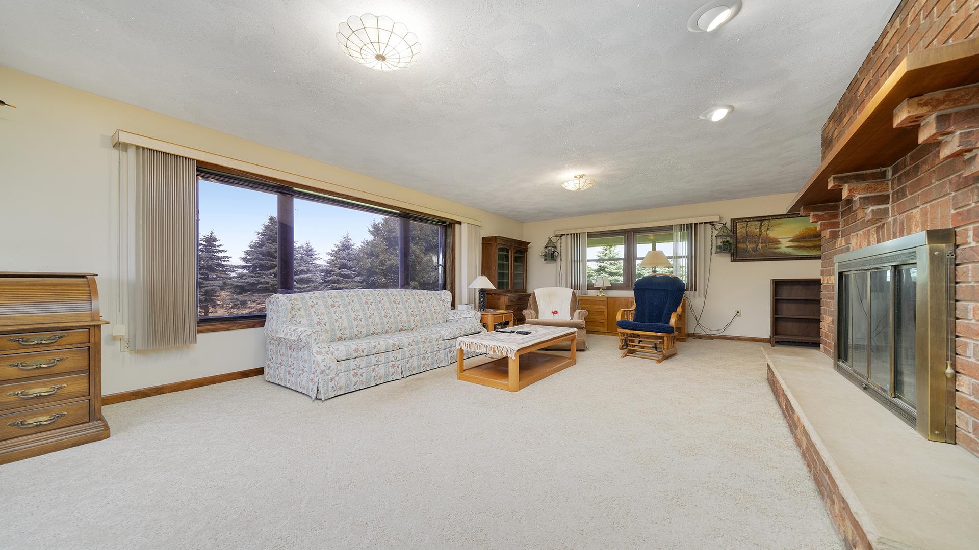 10245 West Penn Corner Road Polo, IL 61064 - Photo 8 of 48 a living room with furniture and a large window
