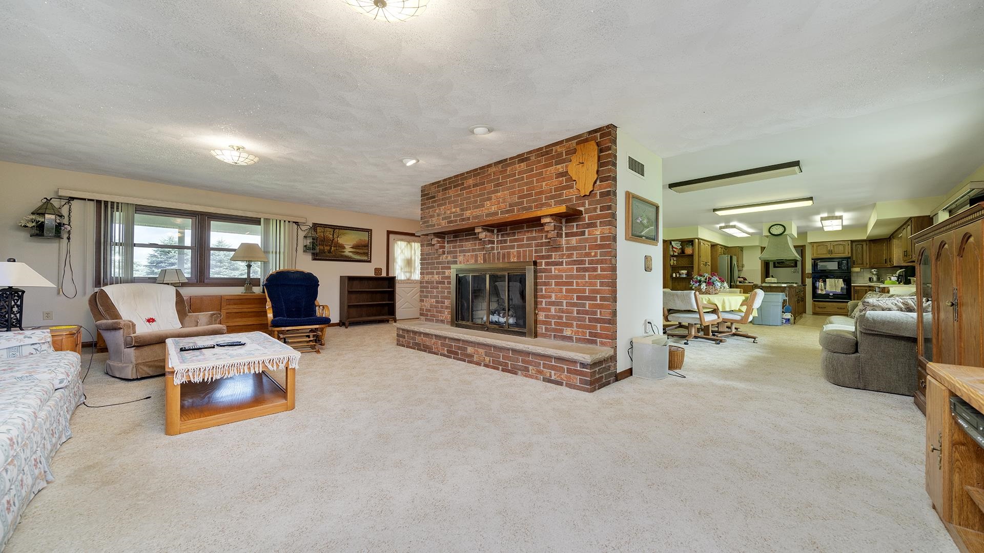 10245 West Penn Corner Road Polo, IL 61064 - Photo 9 of 48 a room with furniture and a fireplace