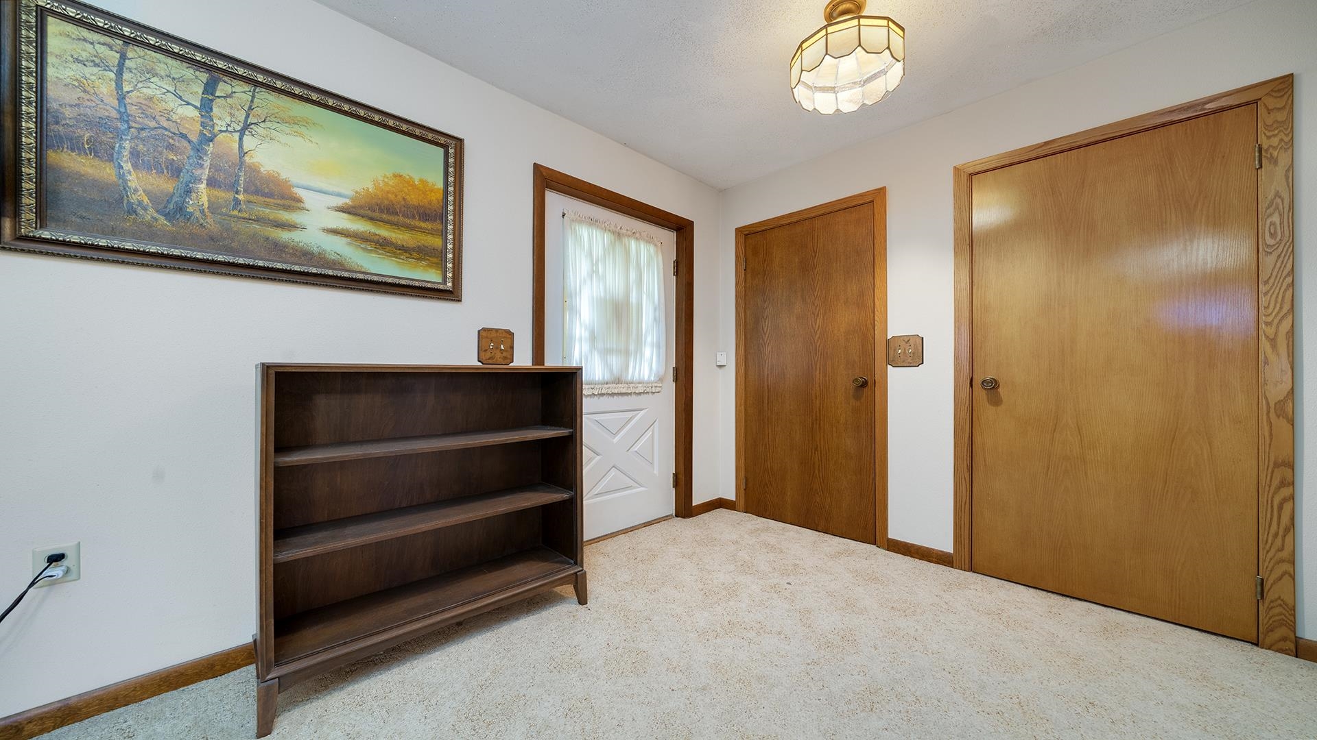 10245 West Penn Corner Road Polo, IL 61064 - Photo 10 of 48 a view of an entryway with wooden floor