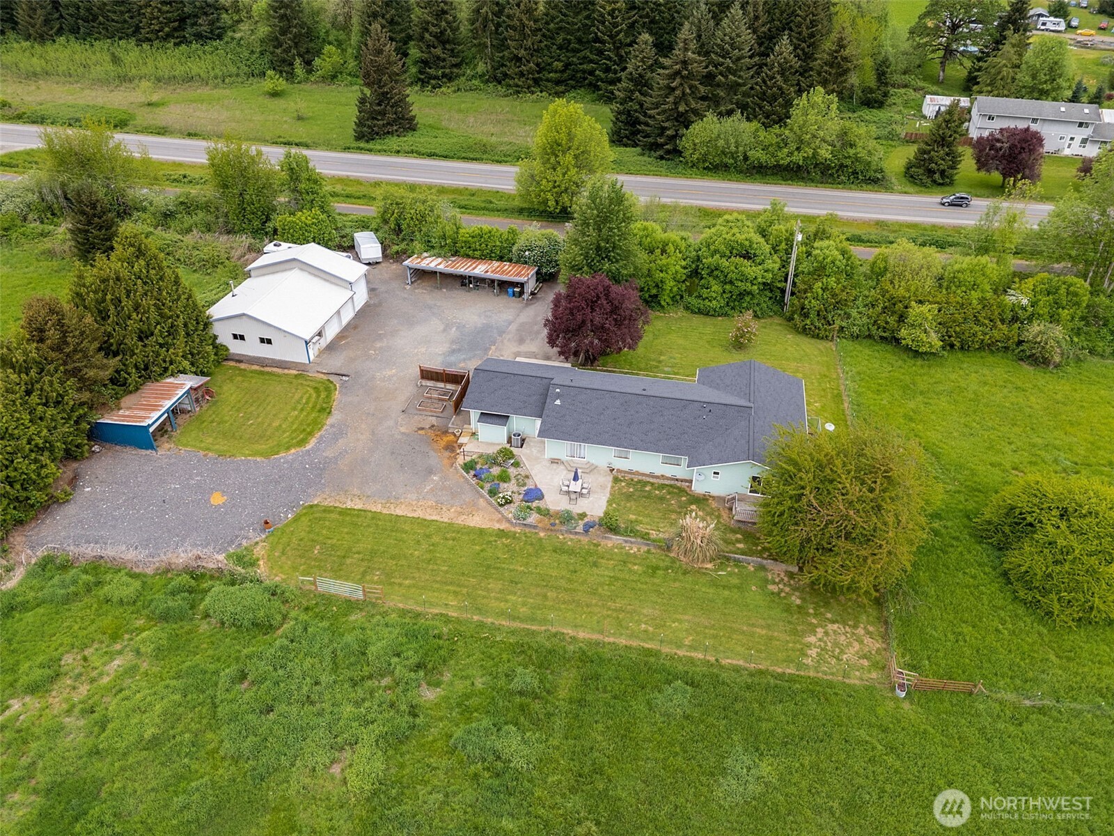 1369 SR 6 Chehalis, WA 98532 - Photo 2 of 39 an aerial view of a house with yard swimming pool and outdoor seating