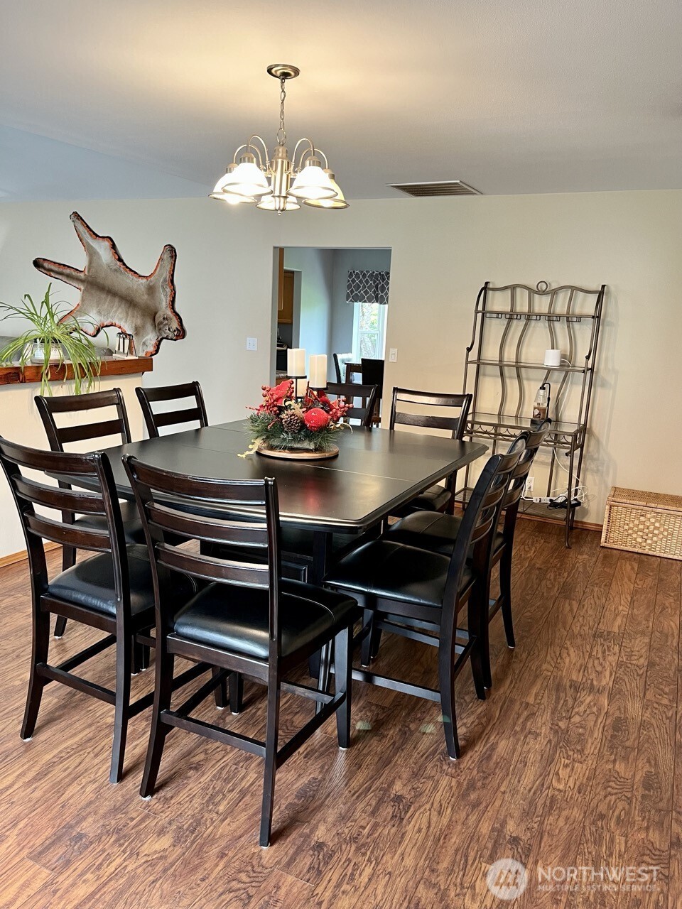 1369 SR 6 Chehalis, WA 98532 - Photo 22 of 39 a view of a dining room with furniture and wooden floor