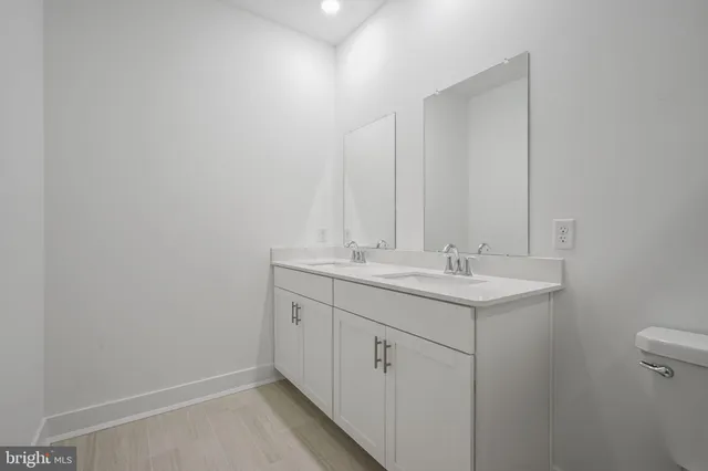 a bathroom with a sink and a vanity