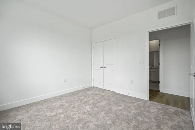 an empty room with an entryway