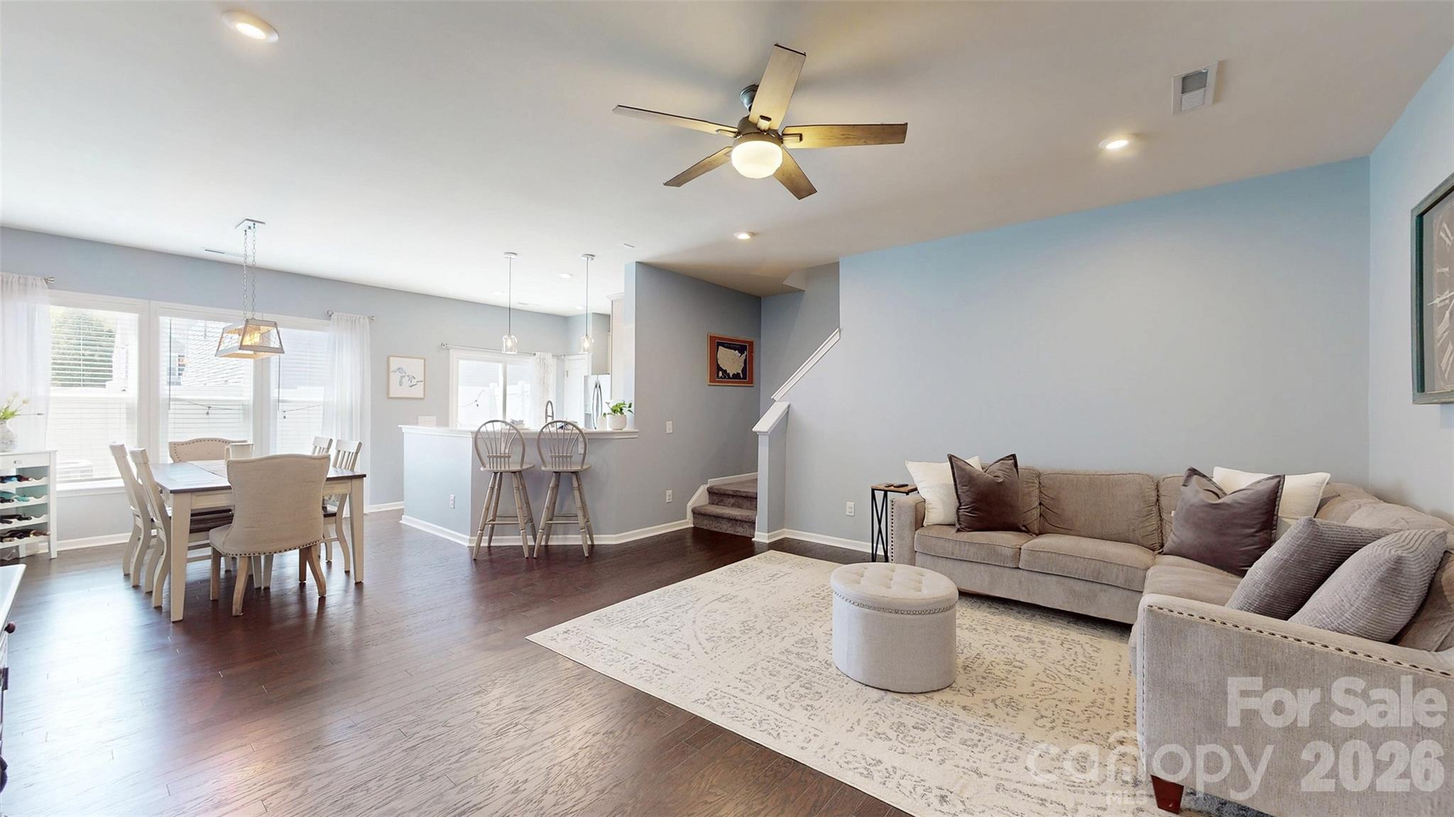 827 Canoe Song Road Fort Mill, SC 29708 - Photo 5 of 33 a living room with furniture and wooden floor