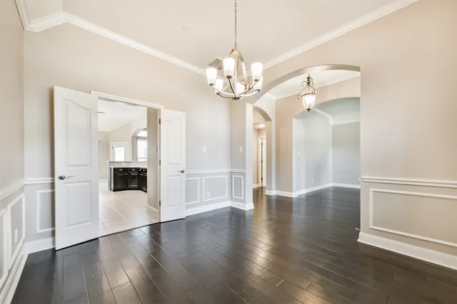 a view of a livingroom with wooden floor
