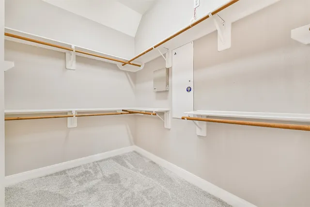 a view of an empty walk in closet