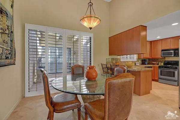 a view of a dining room with furniture