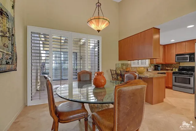 a view of a dining room with furniture