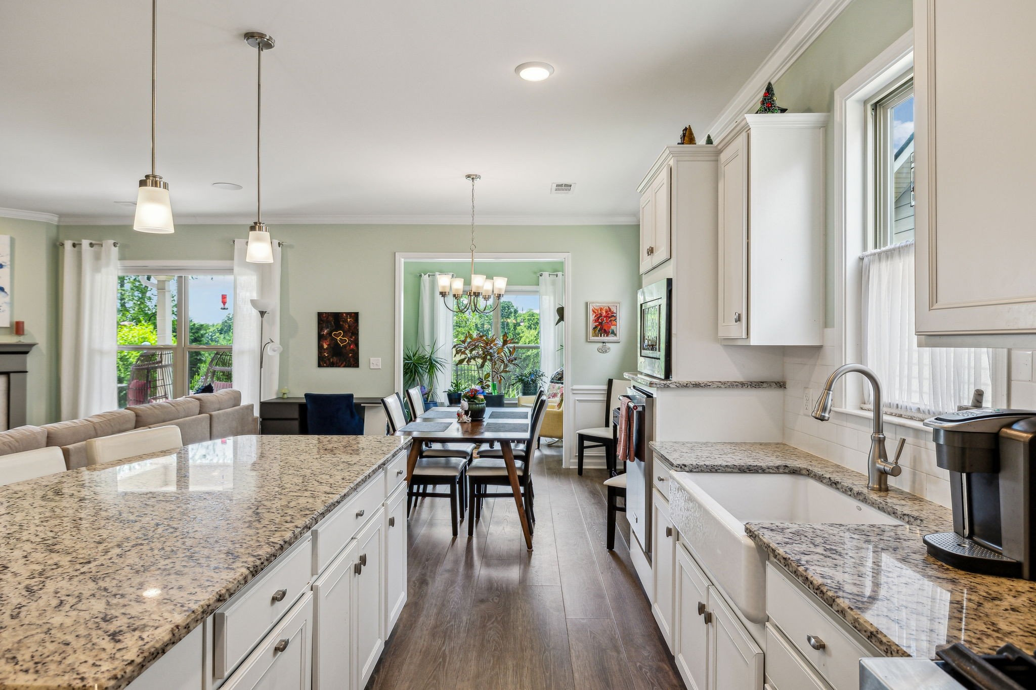 2237 Henderson Drive Spring Hill, TN 37174 - Photo 12 of 61 a kitchen with stainless steel appliances granite countertop sink stove and wooden floor