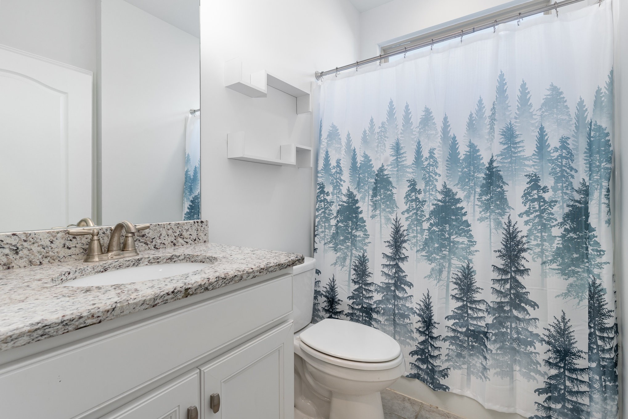 2237 Henderson Drive Spring Hill, TN 37174 - Photo 38 of 61 a bathroom with a granite countertop sink and a toilet